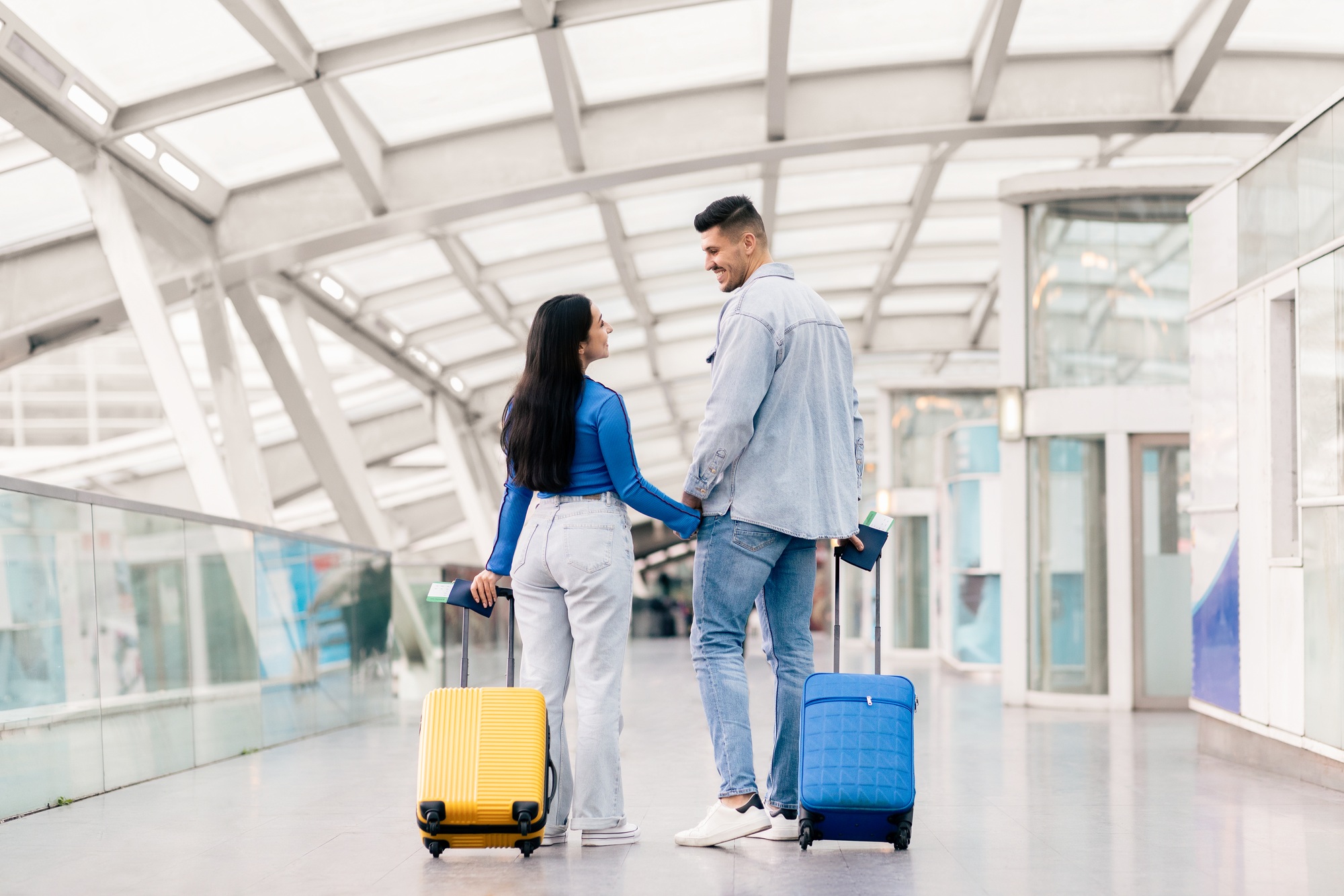 Couple enjoying a weekend getaway together at the airport