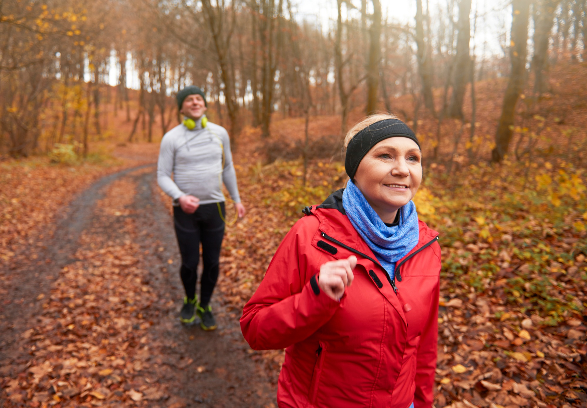 Couple having a slow walk after running